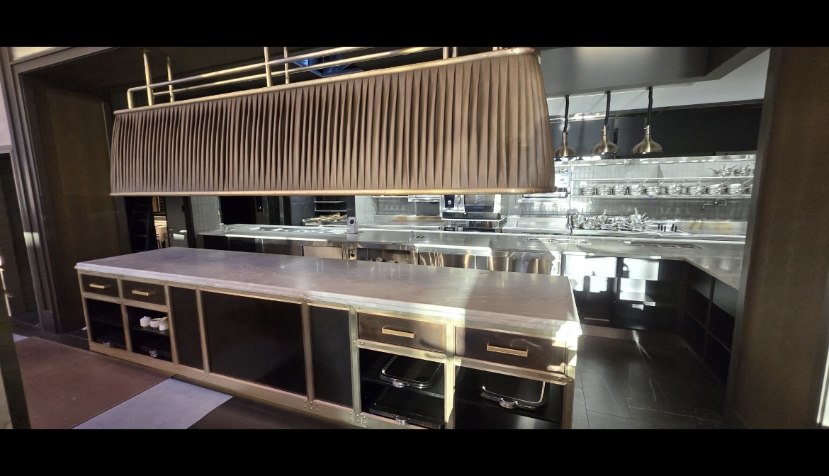 Large open plan kitchen with white marble